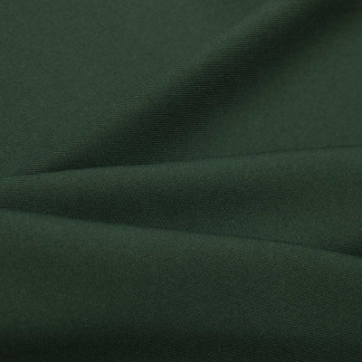 Ткань костюмная 21010 2076, 225 гр/м2, шир.150см, цвет т.зеленый - купить в Сызрани. Цена 394.71 руб.